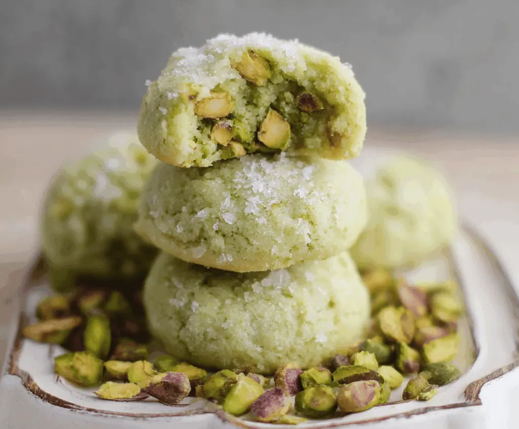 Delicious pistachio wedding cookies with a golden, nutty exterior and a hint of green, perfect for special occasions and gift-giving.