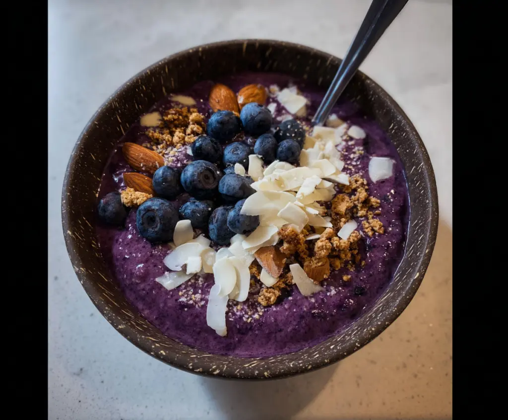 Vibrant Blueberry Bliss Smoothie Bowl topped with fresh blueberries and granola for a healthy breakfast