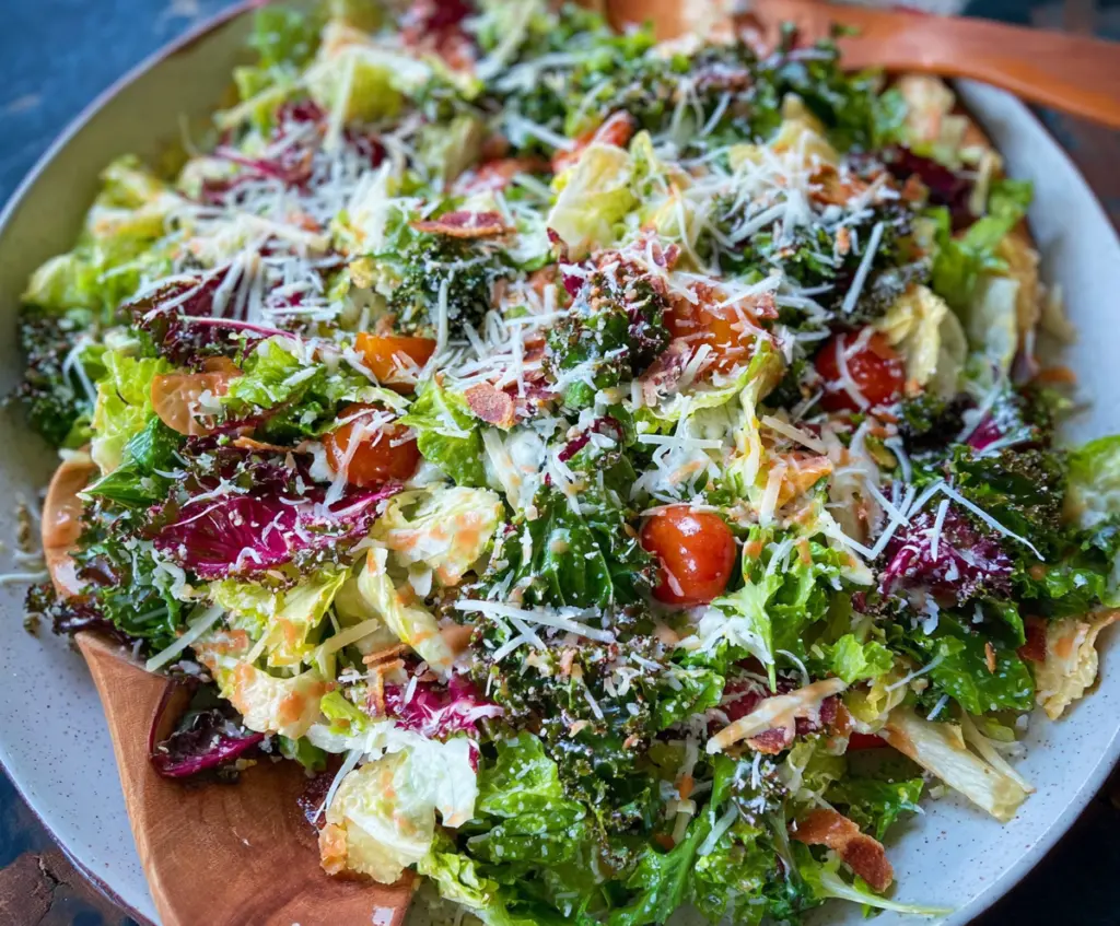 Fresh and colorful Pizza Night Salad with cherry tomatoes, mozzarella, and leafy greens.